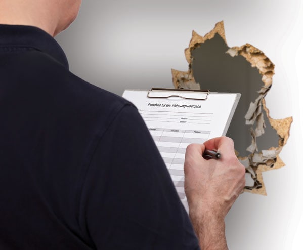 property manager assessing tenant damage